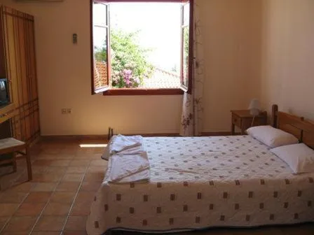 Bed in Hotel Heleni Apartments