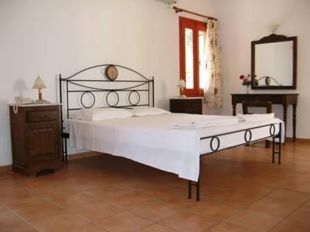 Bed in Hotel Heleni Apartments