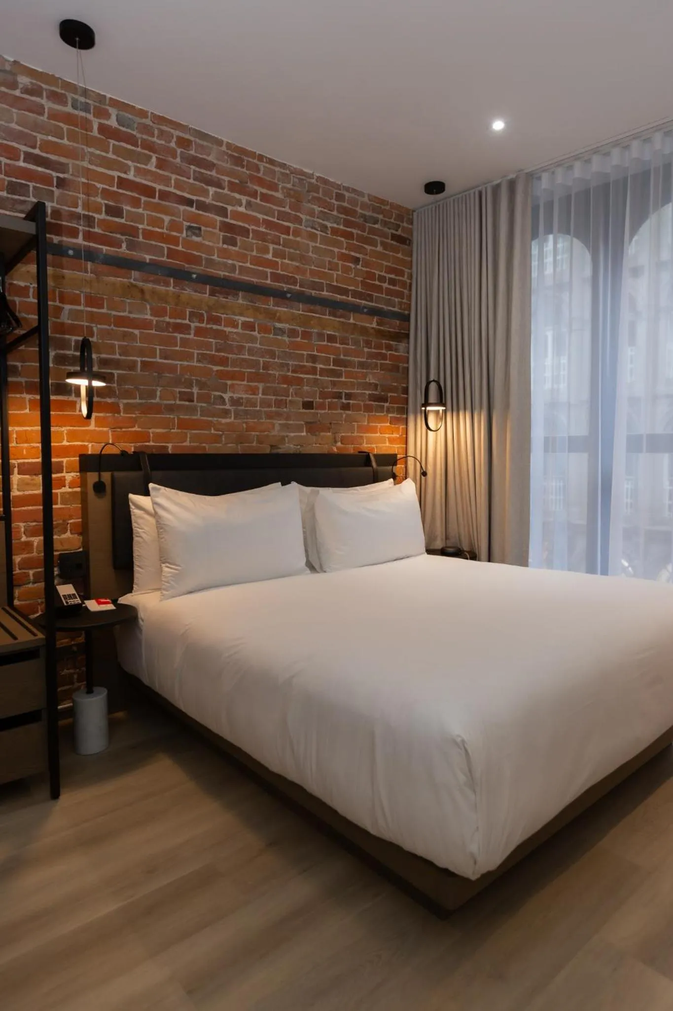Bedroom, Bed in Le Petit Hotel Notre Dame