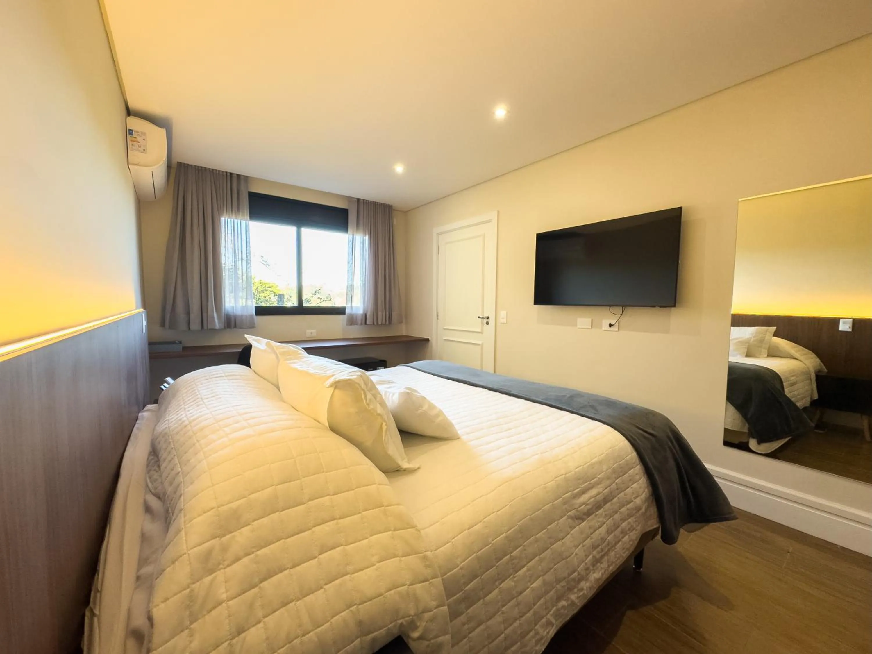 Bed in Pousadinha Campos