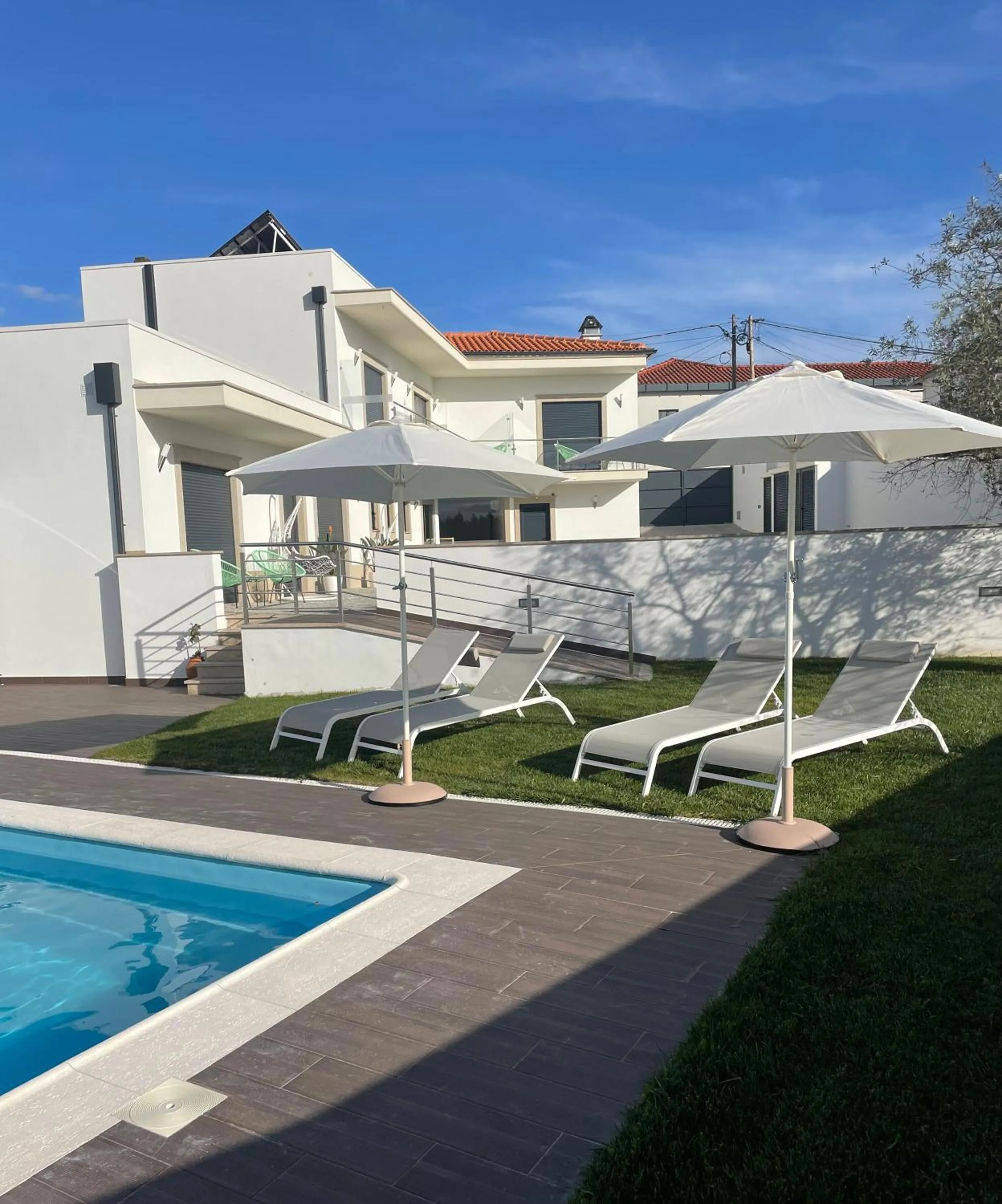 Swimming pool in Alojamento Jasmine