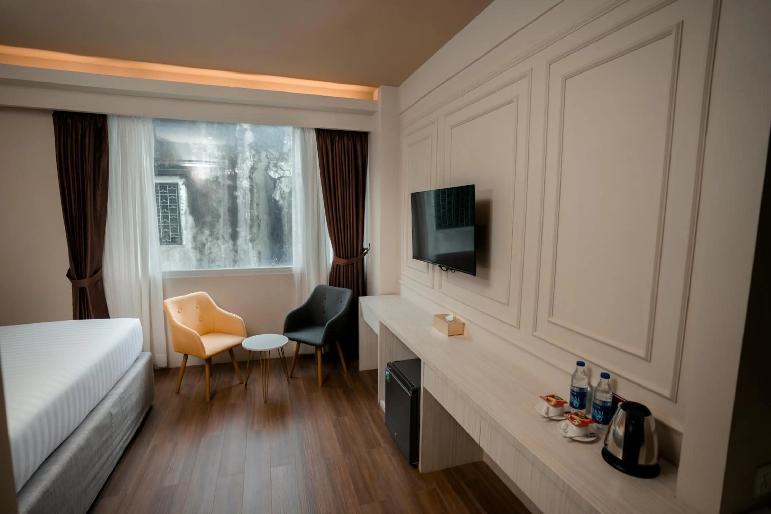 Bed in The Rangoon Hotel