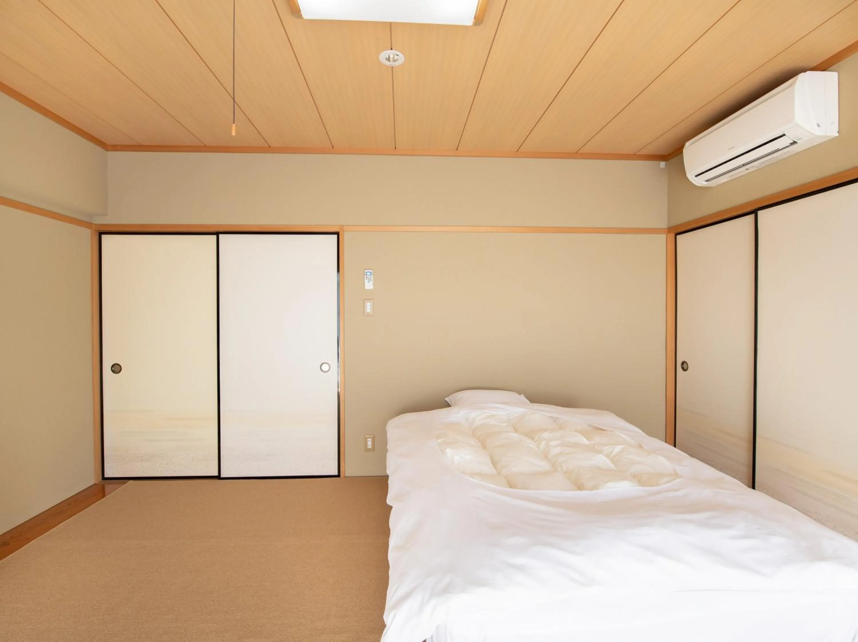 Bed in Chateraise Lodge Kasugai