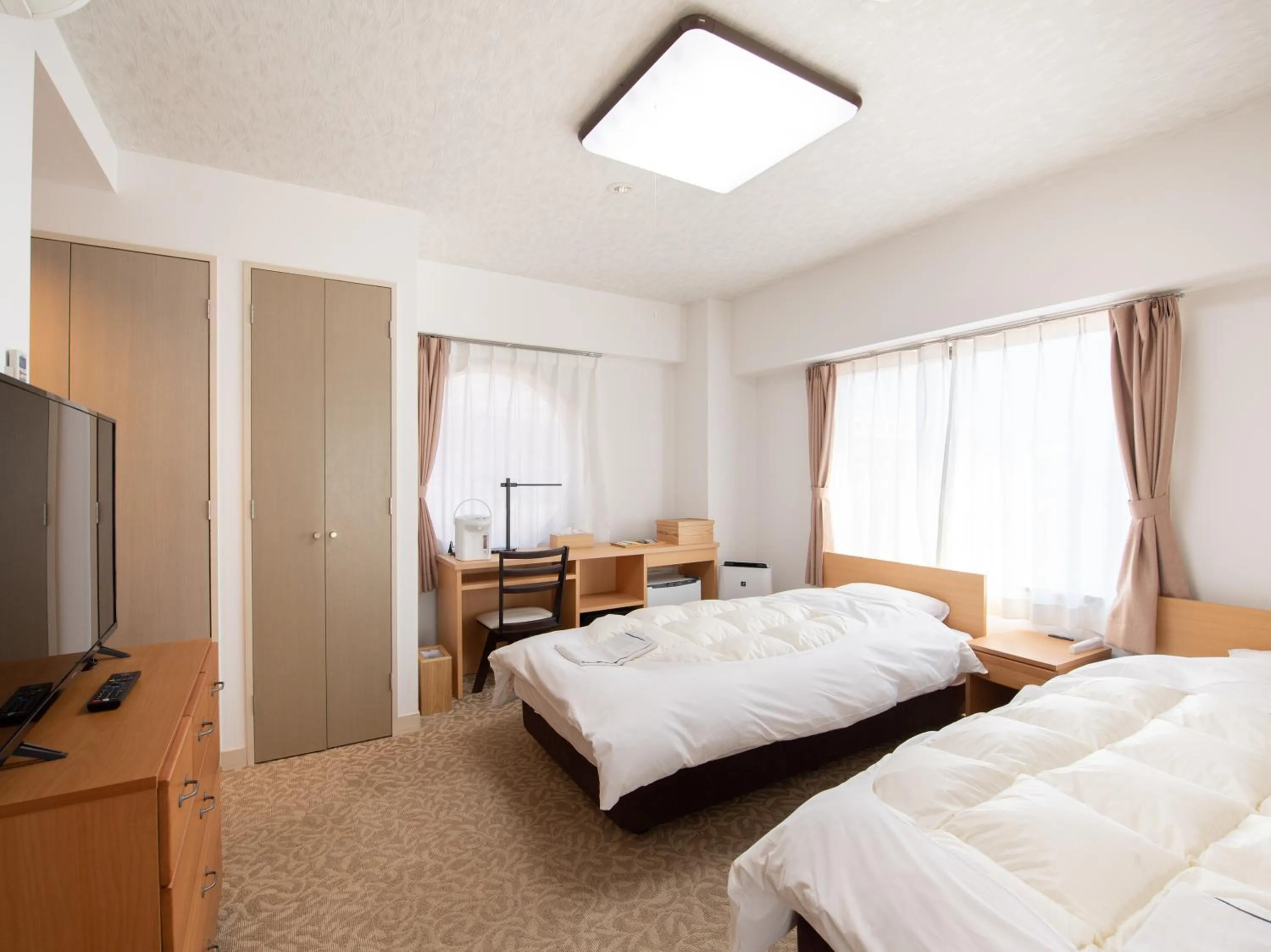 Bed in Chateraise Lodge Kasugai