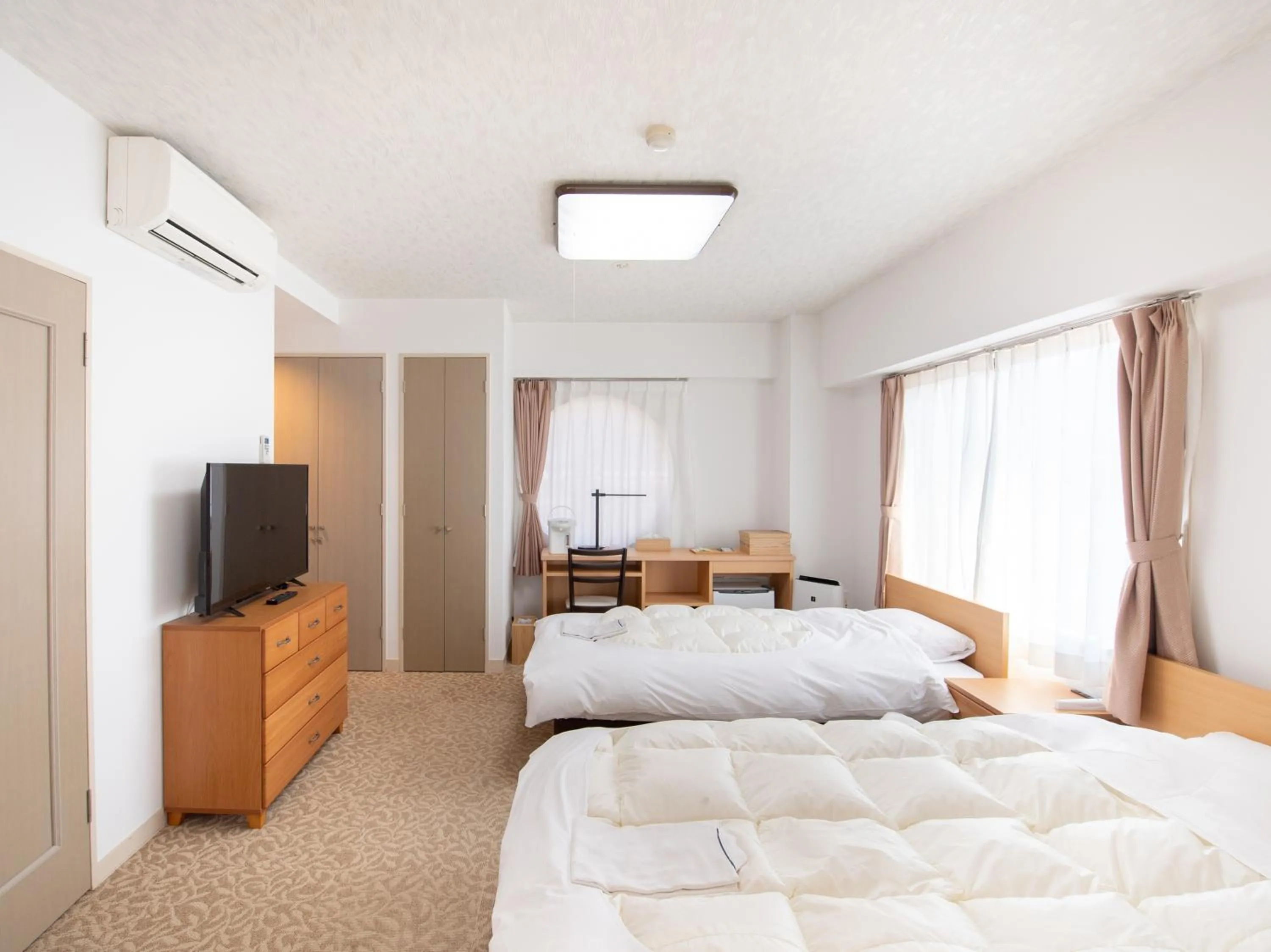 Bed in Chateraise Lodge Kasugai