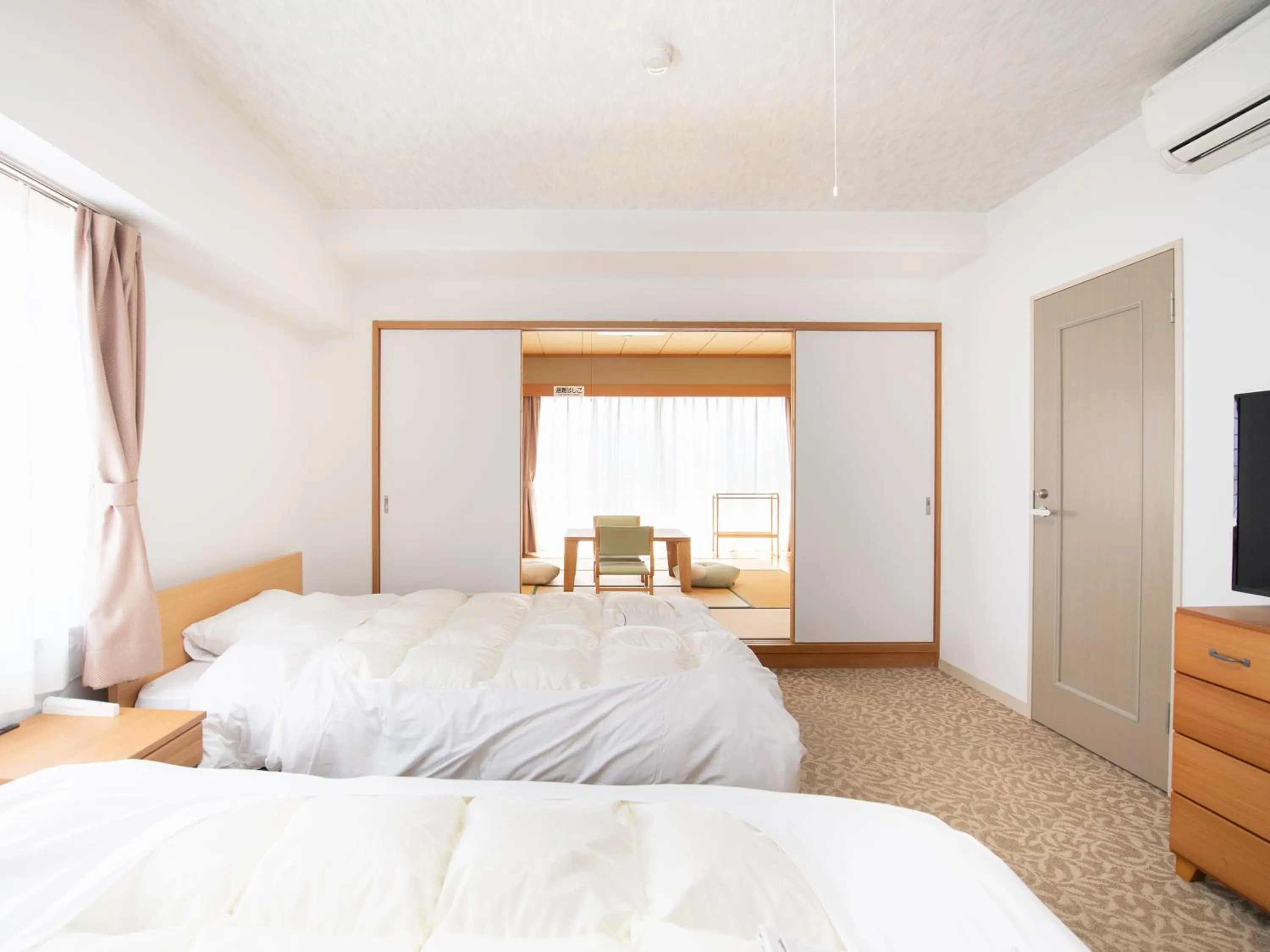 Bed in Chateraise Lodge Kasugai