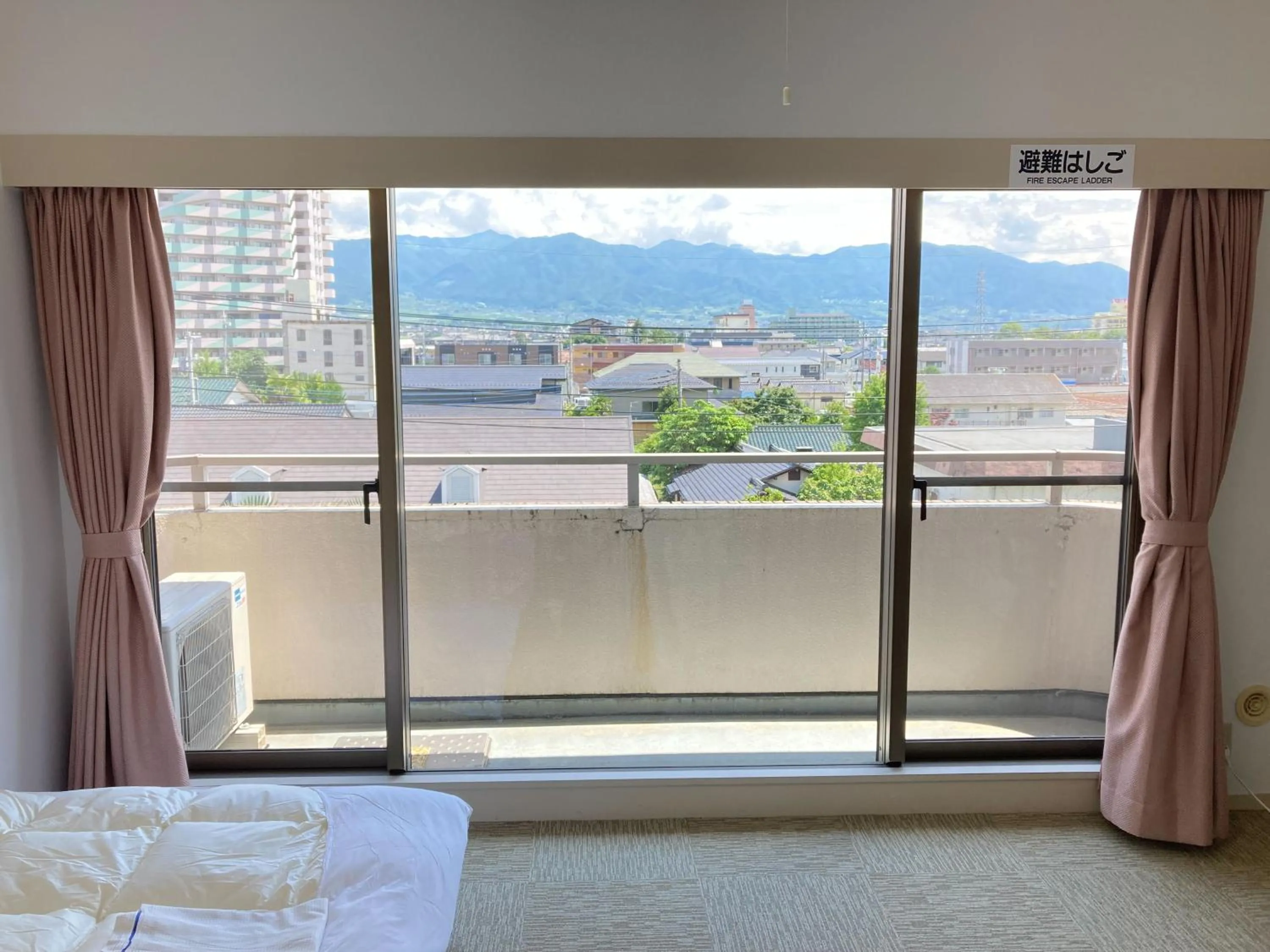 Bed in Chateraise Lodge Kasugai