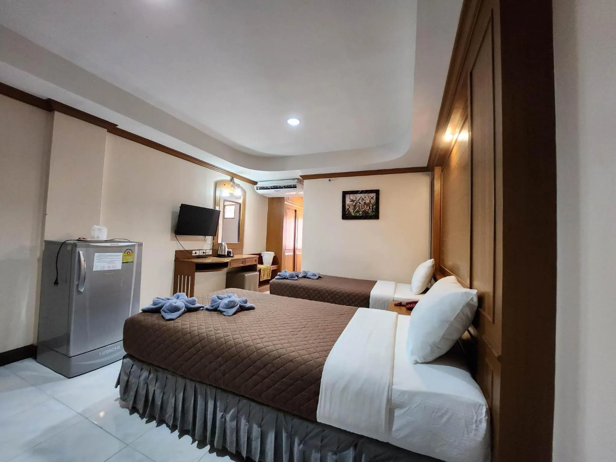 Bedroom in White Rose​ Hotel​ II​