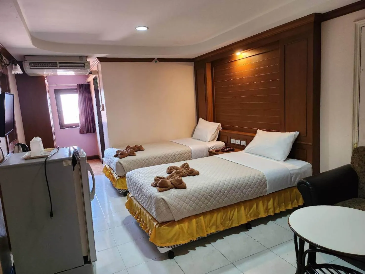 Bedroom in White Rose​ Hotel​ II​