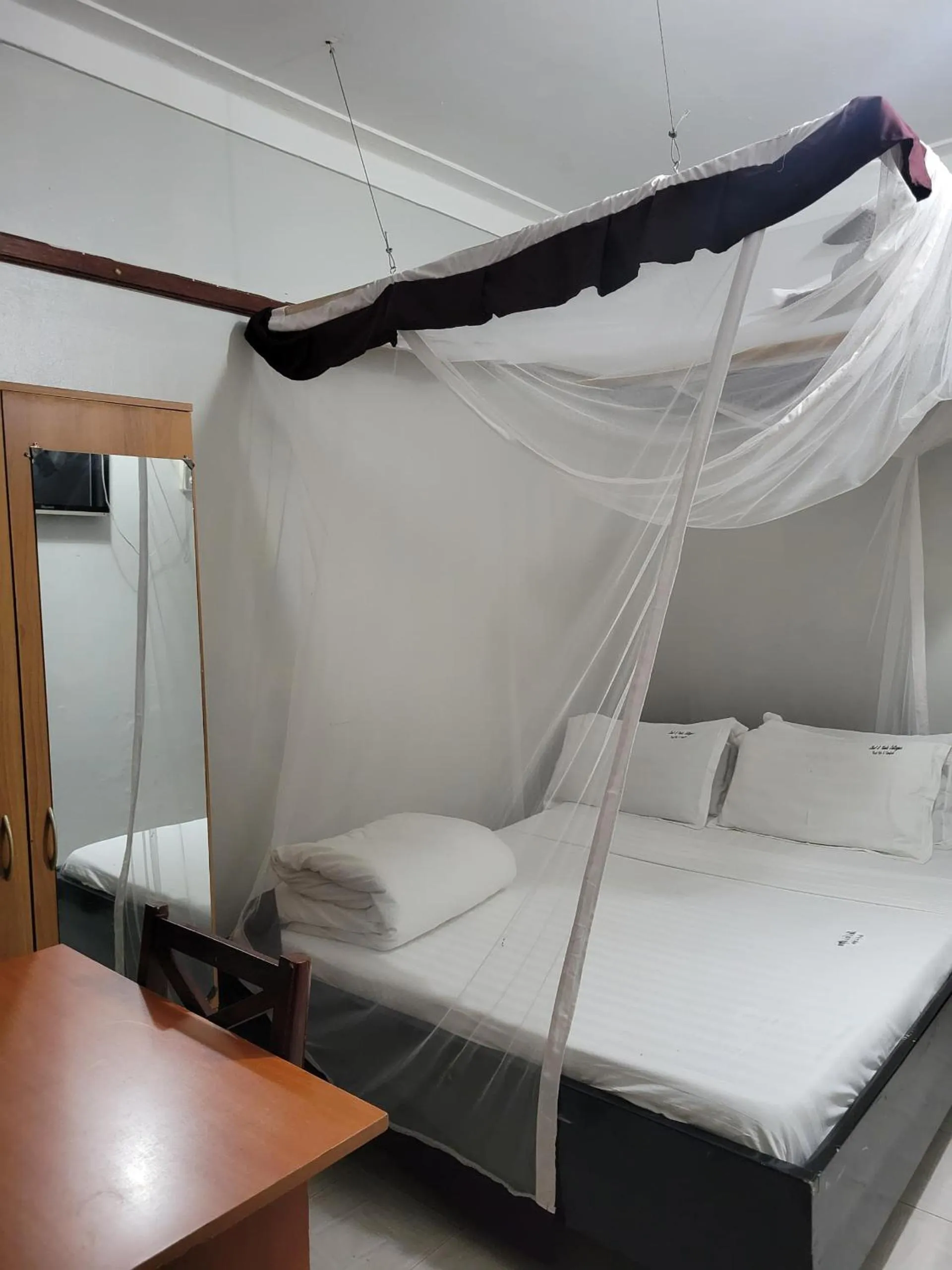 Bed in Chel and Vade Cottages