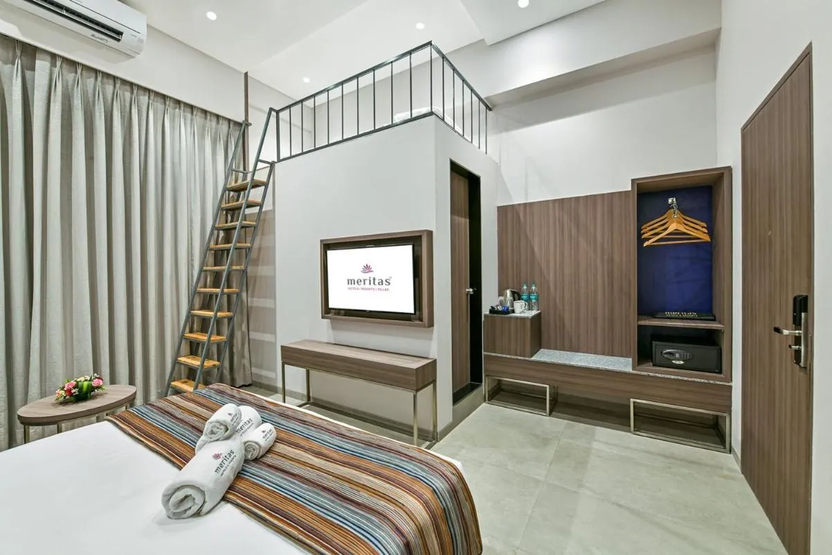 Bed in Meritas Aura Resort