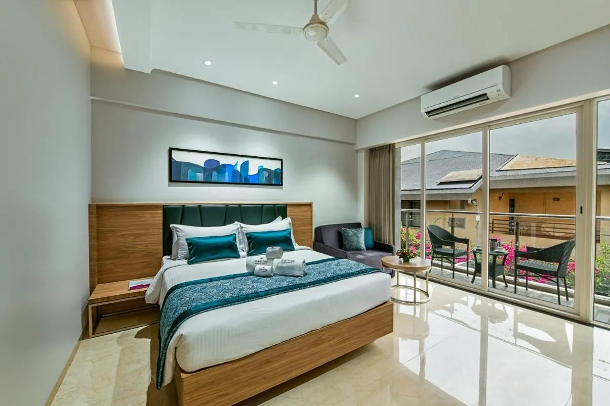 Bed in Meritas Aura Resort