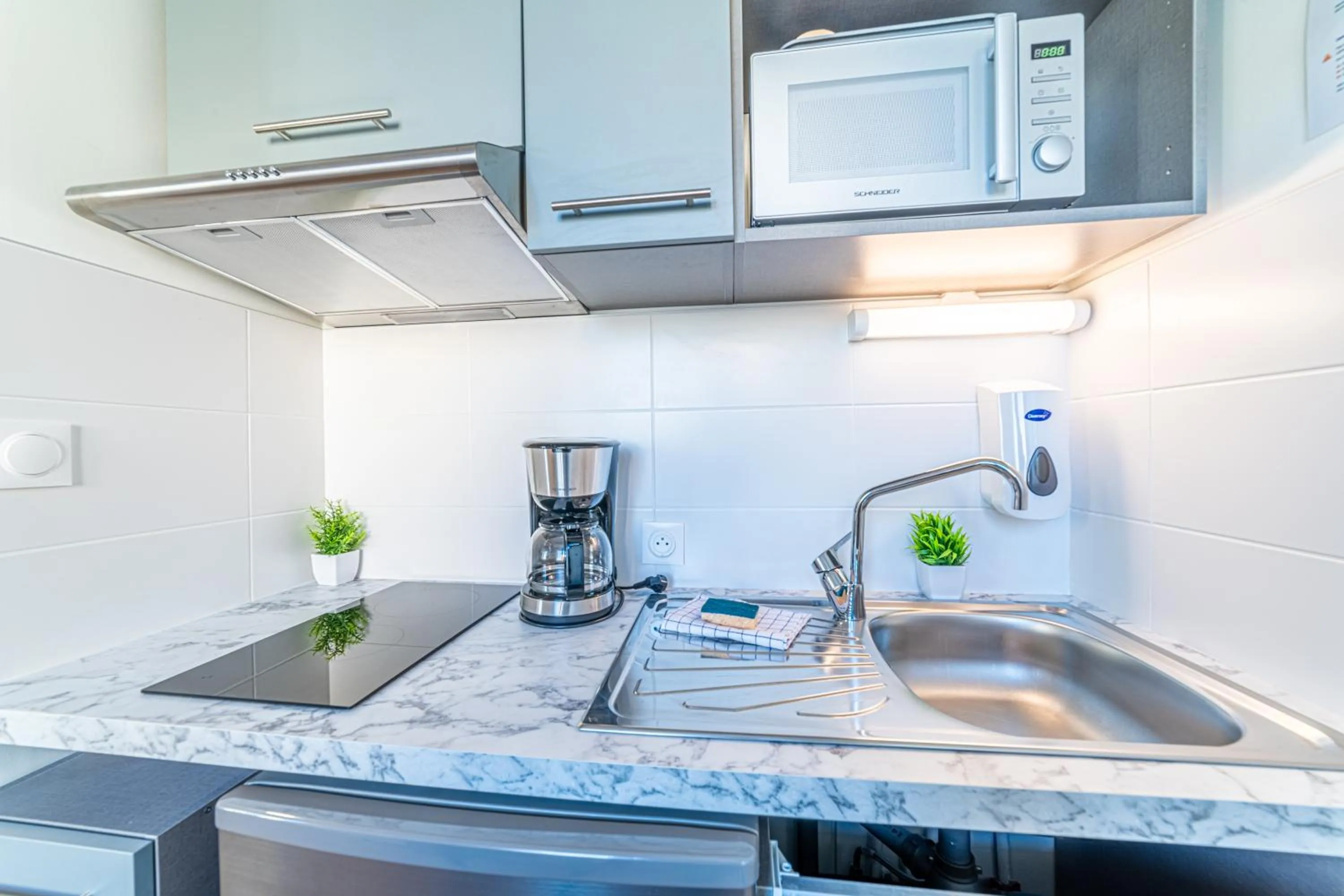 Kitchen or kitchenette in Montempô Appart'Hôtel Toulouse Cité Internationale