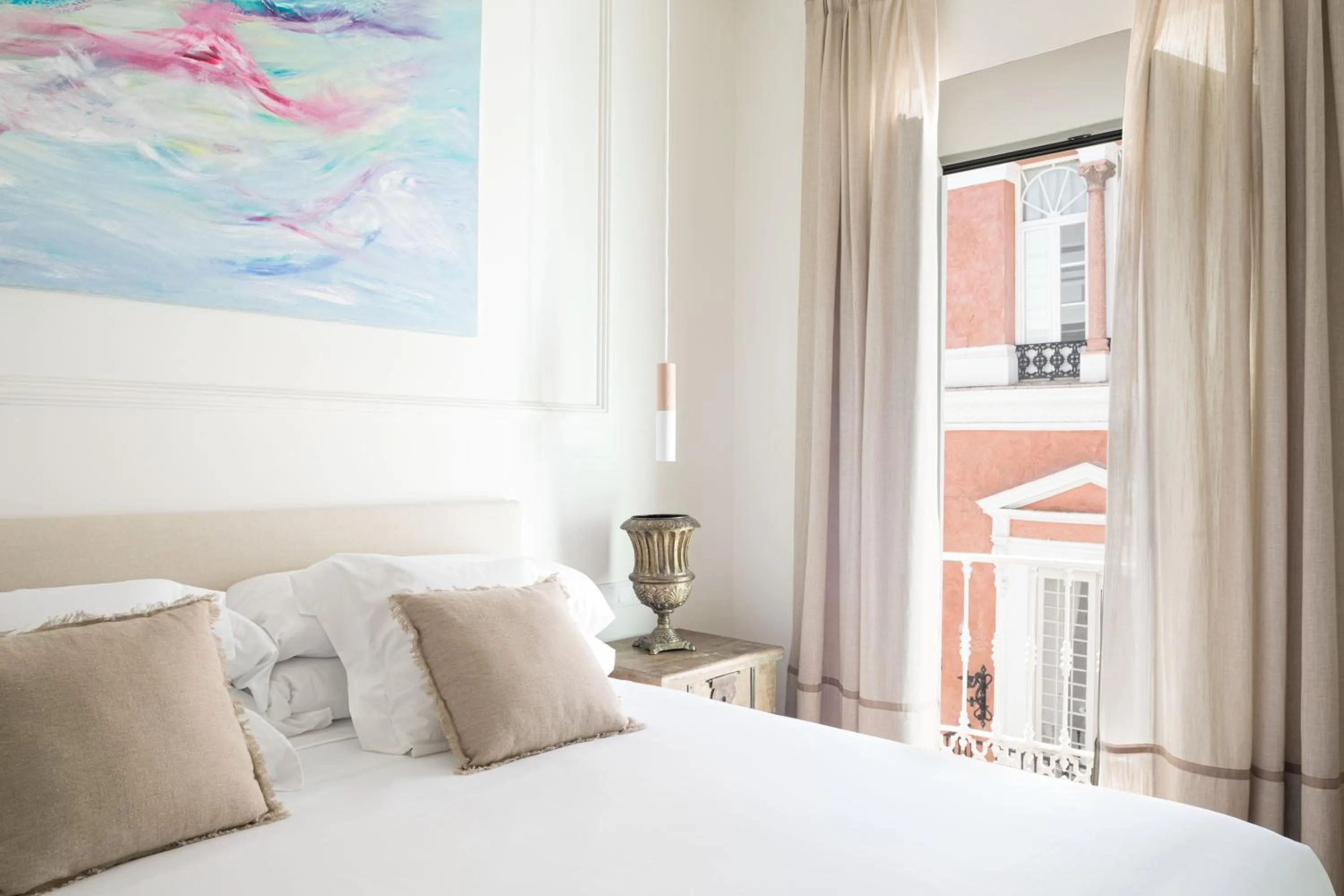 Bed in Mylu Suites by Puerta Catedral