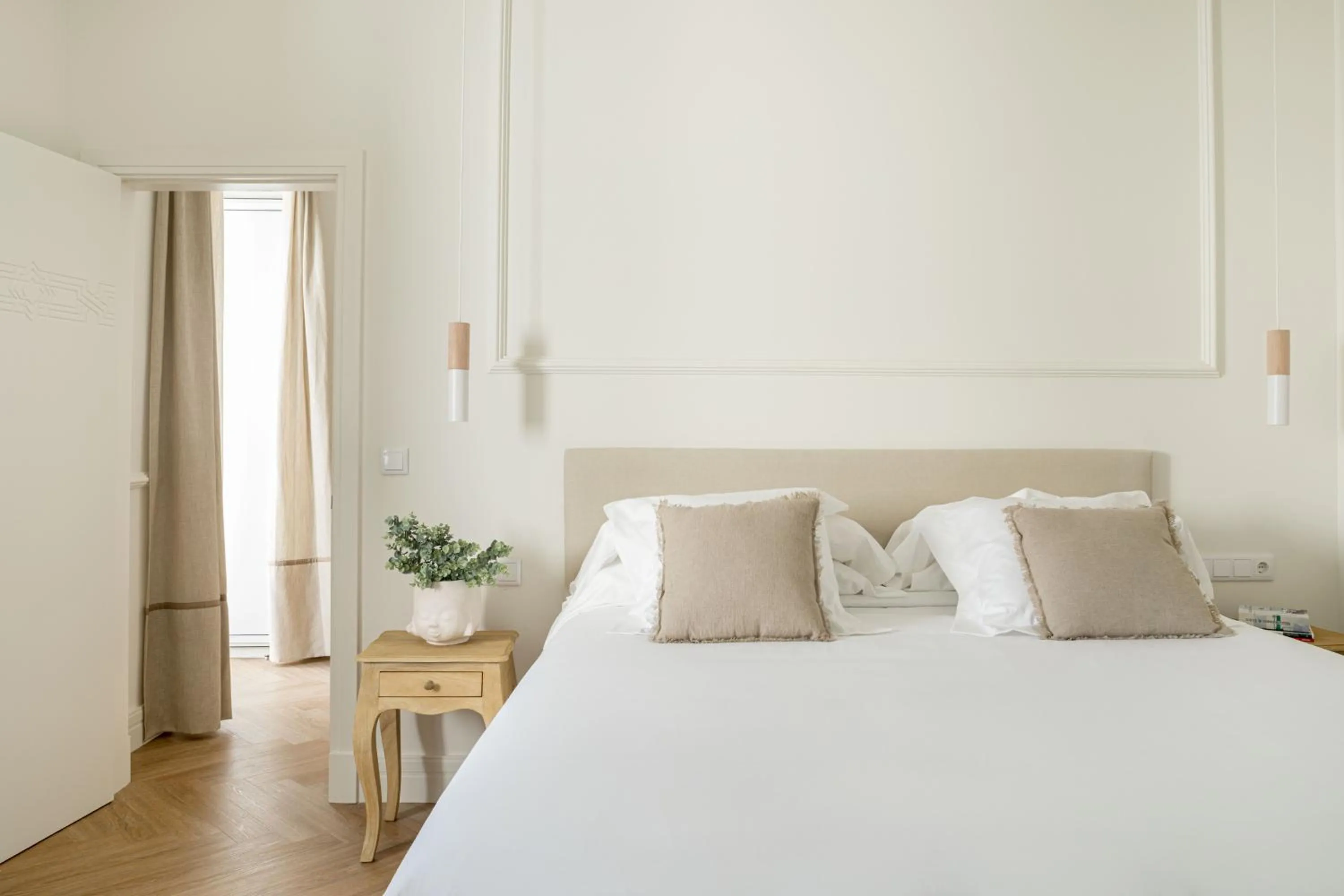 Bed in Mylu Suites by Puerta Catedral