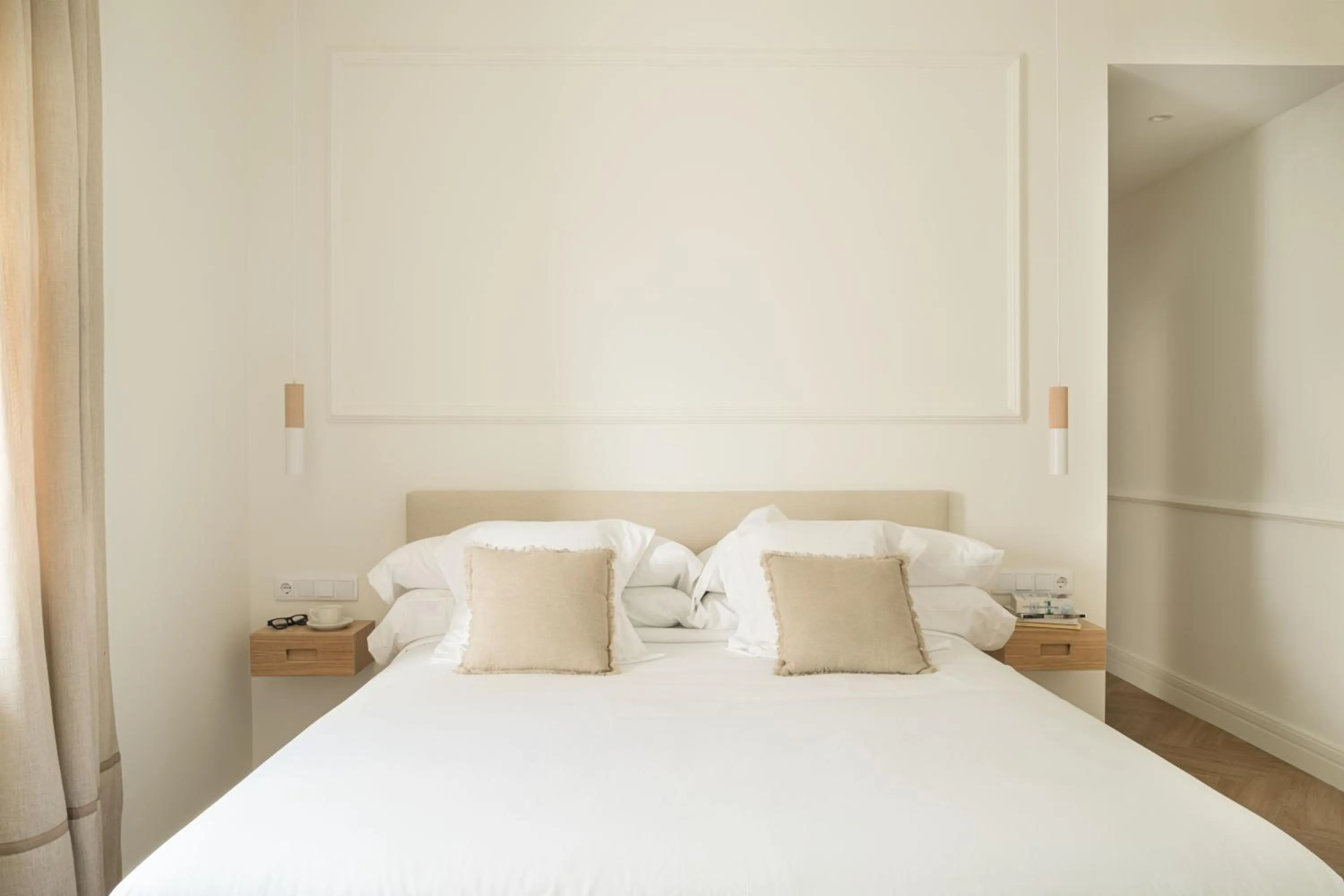 Bed in Mylu Suites by Puerta Catedral