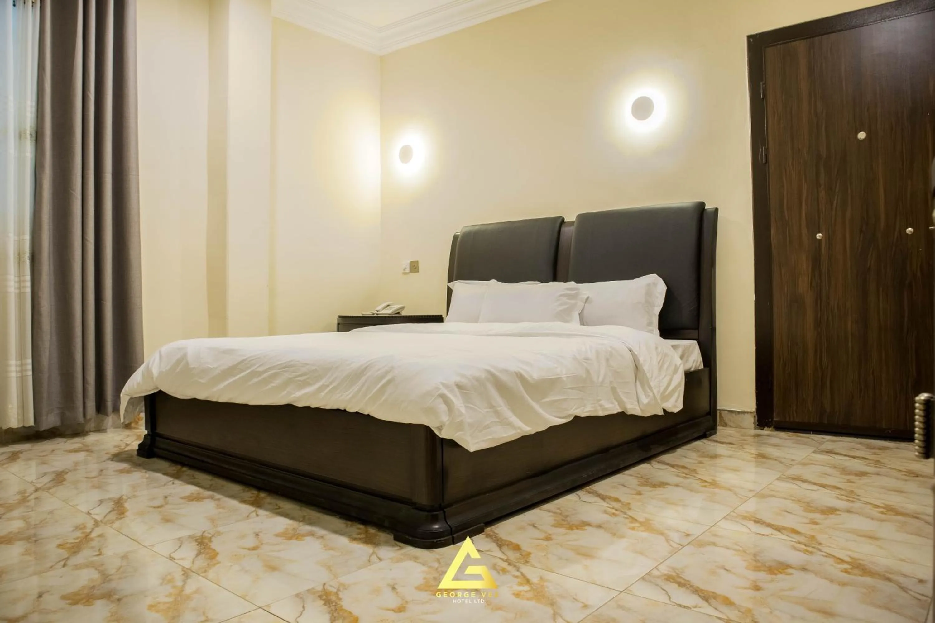 Bed in GEORGE VEE HOTEL LTD