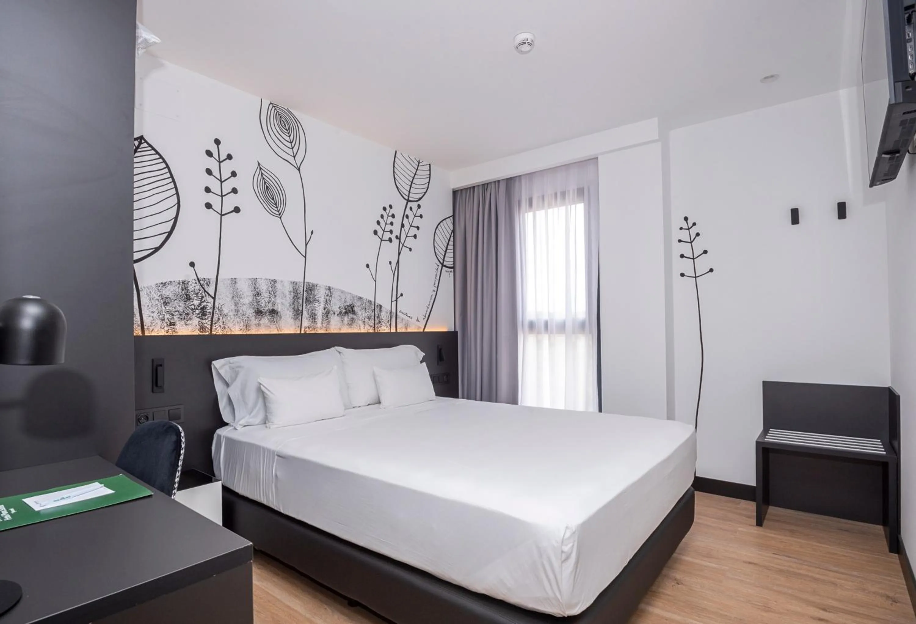 Bed in Sercotel Plana Suites