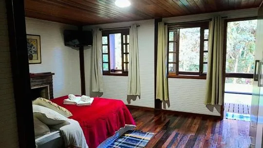 Bed in Pousada Bosque do Visconde