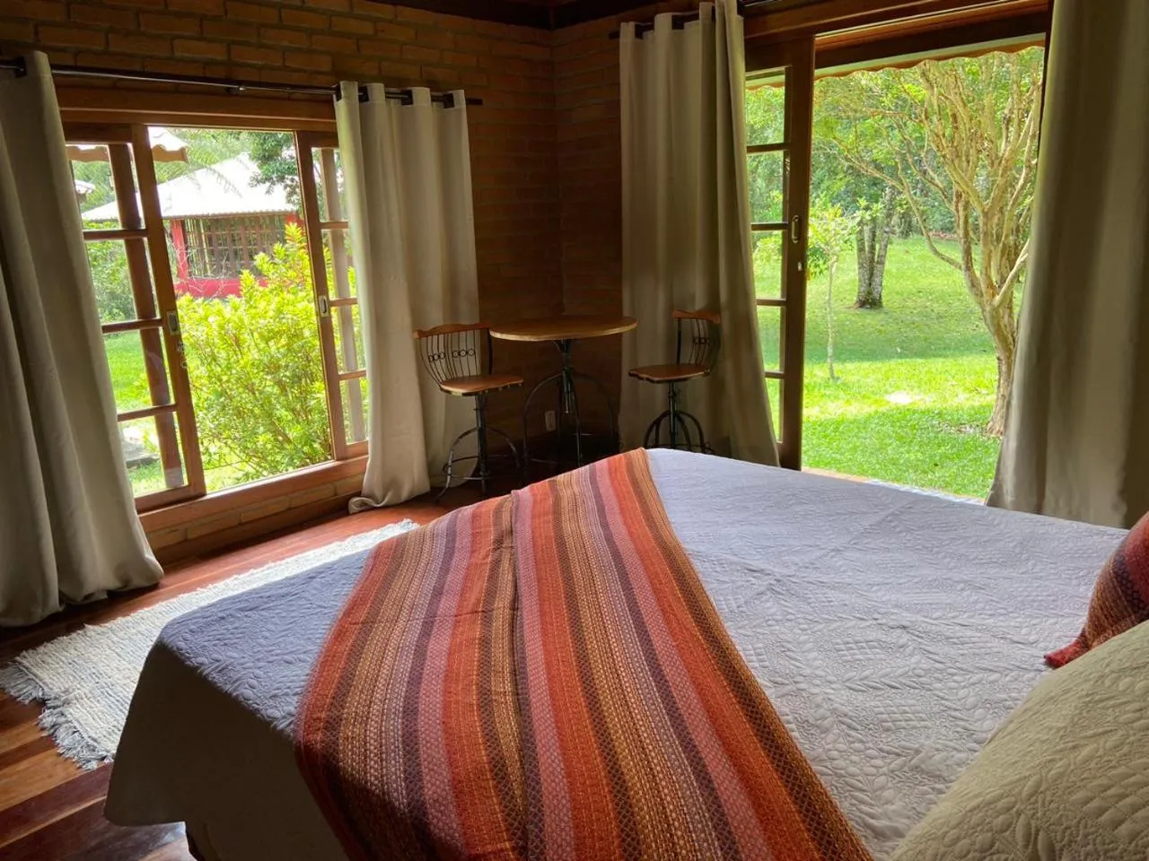 Bed in Pousada Bosque do Visconde