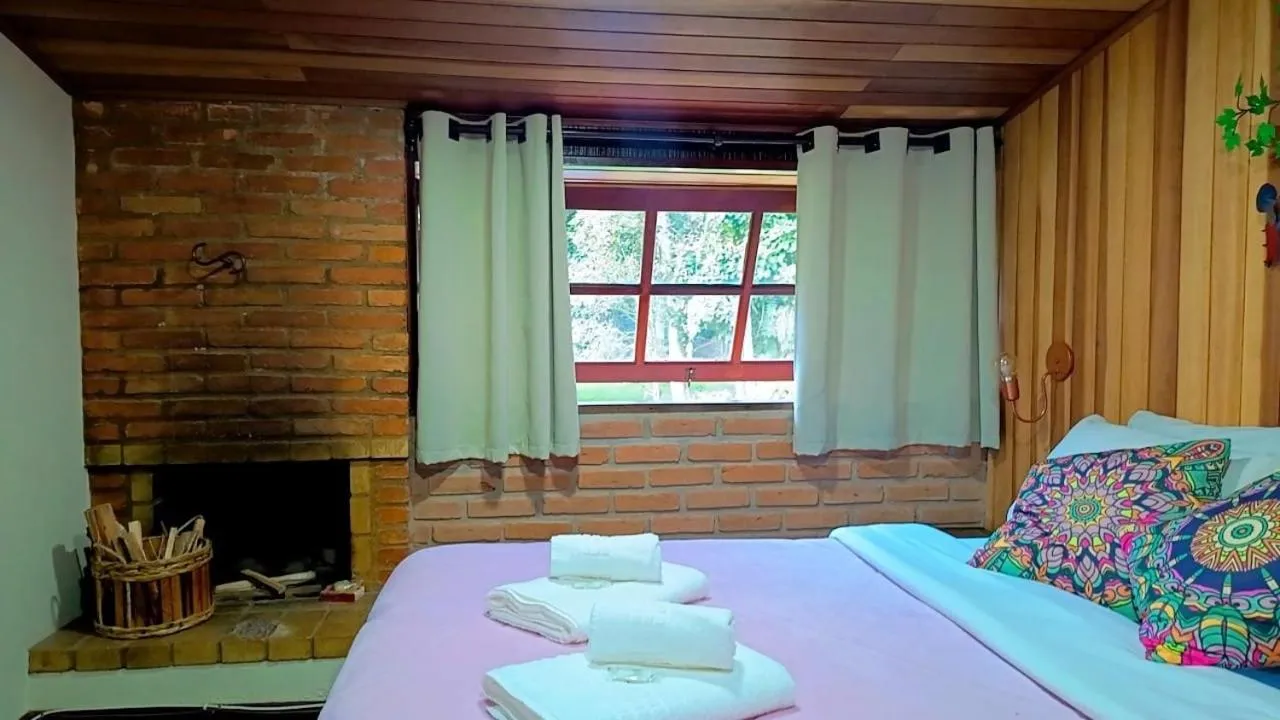 Bed in Pousada Bosque do Visconde