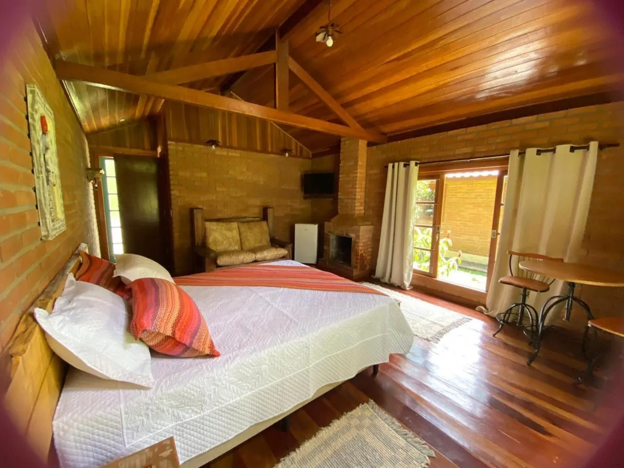 Photo of the whole room, Bed in Pousada Bosque do Visconde