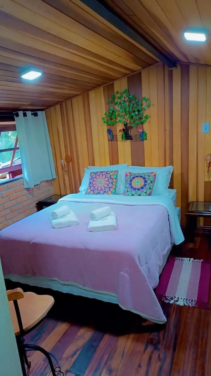 Bed in Pousada Bosque do Visconde