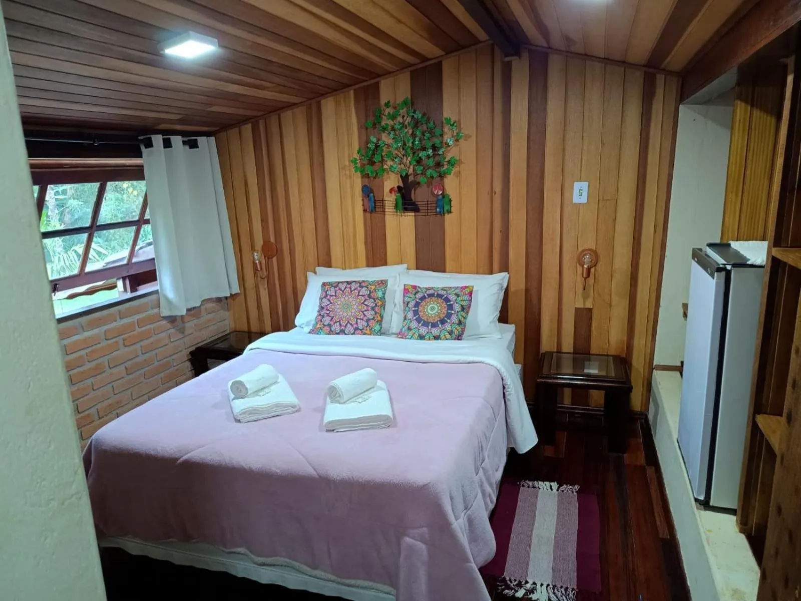 Bed in Pousada Bosque do Visconde