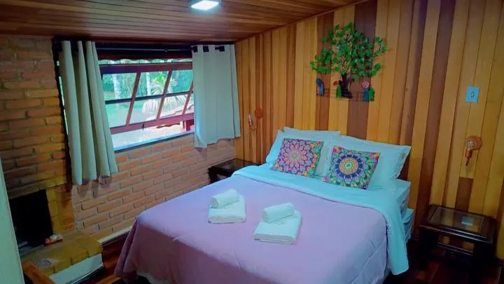 Bed in Pousada Bosque do Visconde