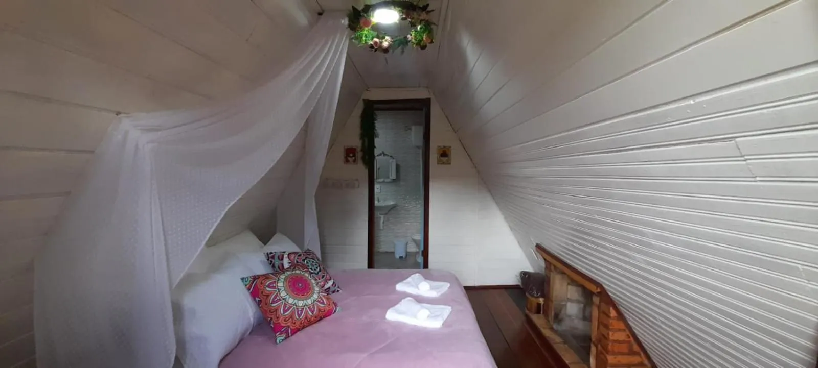 Bed in Pousada Bosque do Visconde