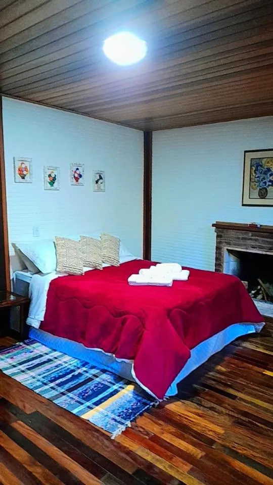 Bed in Pousada Bosque do Visconde