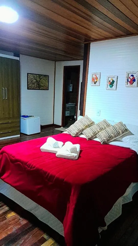 Bed in Pousada Bosque do Visconde