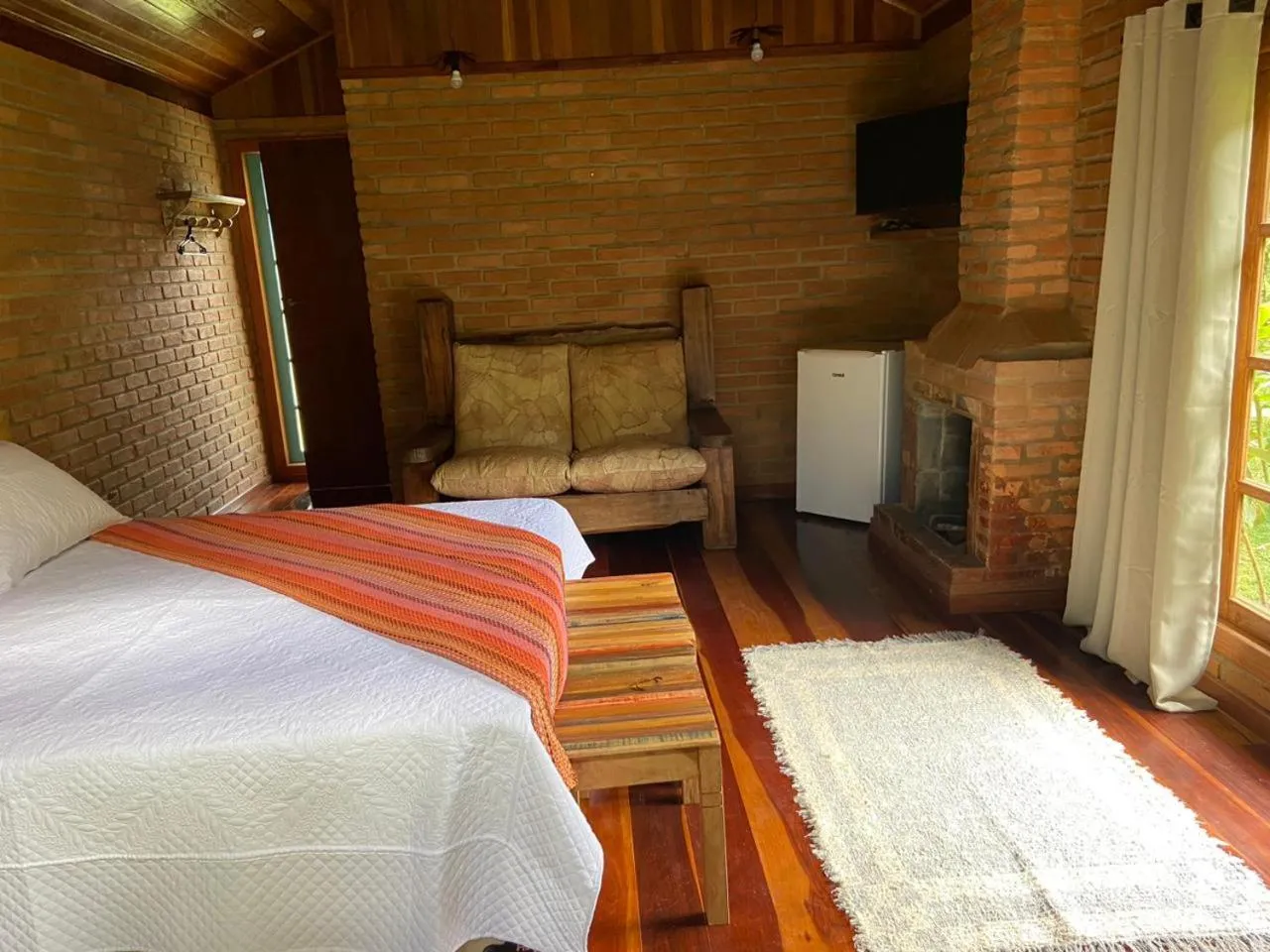 Bed in Pousada Bosque do Visconde