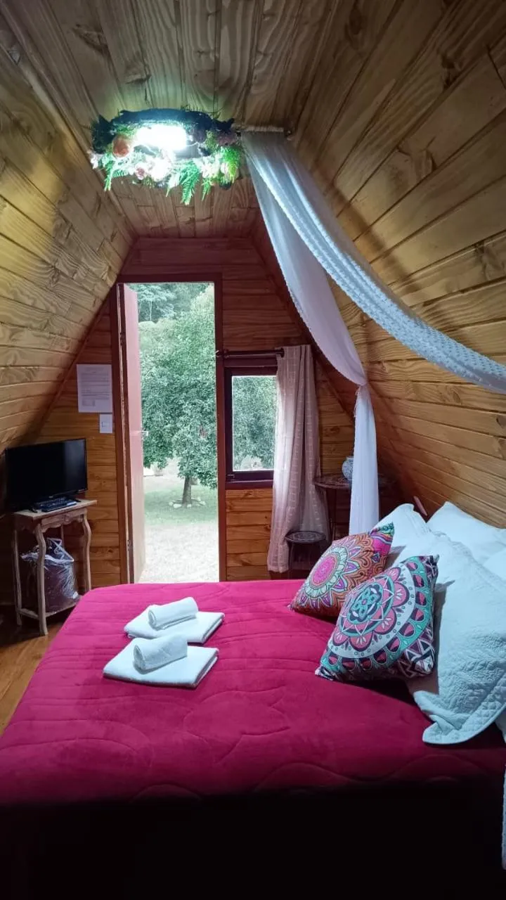Bed in Pousada Bosque do Visconde