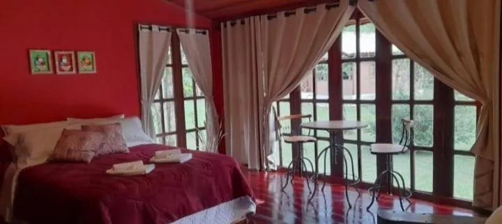 Bed in Pousada Bosque do Visconde