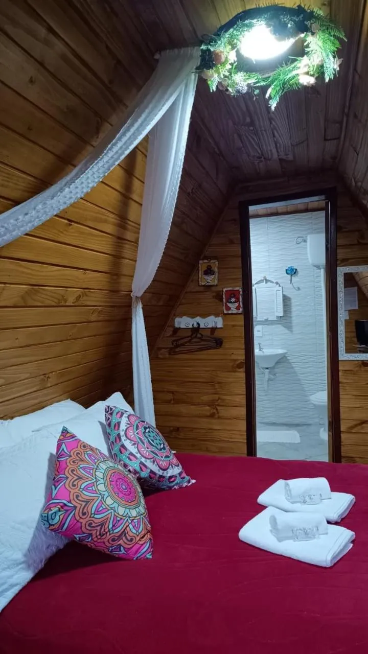 Bed in Pousada Bosque do Visconde