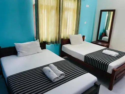 Single Room with Private Bathroom - single occupancy in Cinnamon Tree Tourist Rest Single Room with Private Bathroom - single occupancy in Cinnamon Tree Tourist Rest