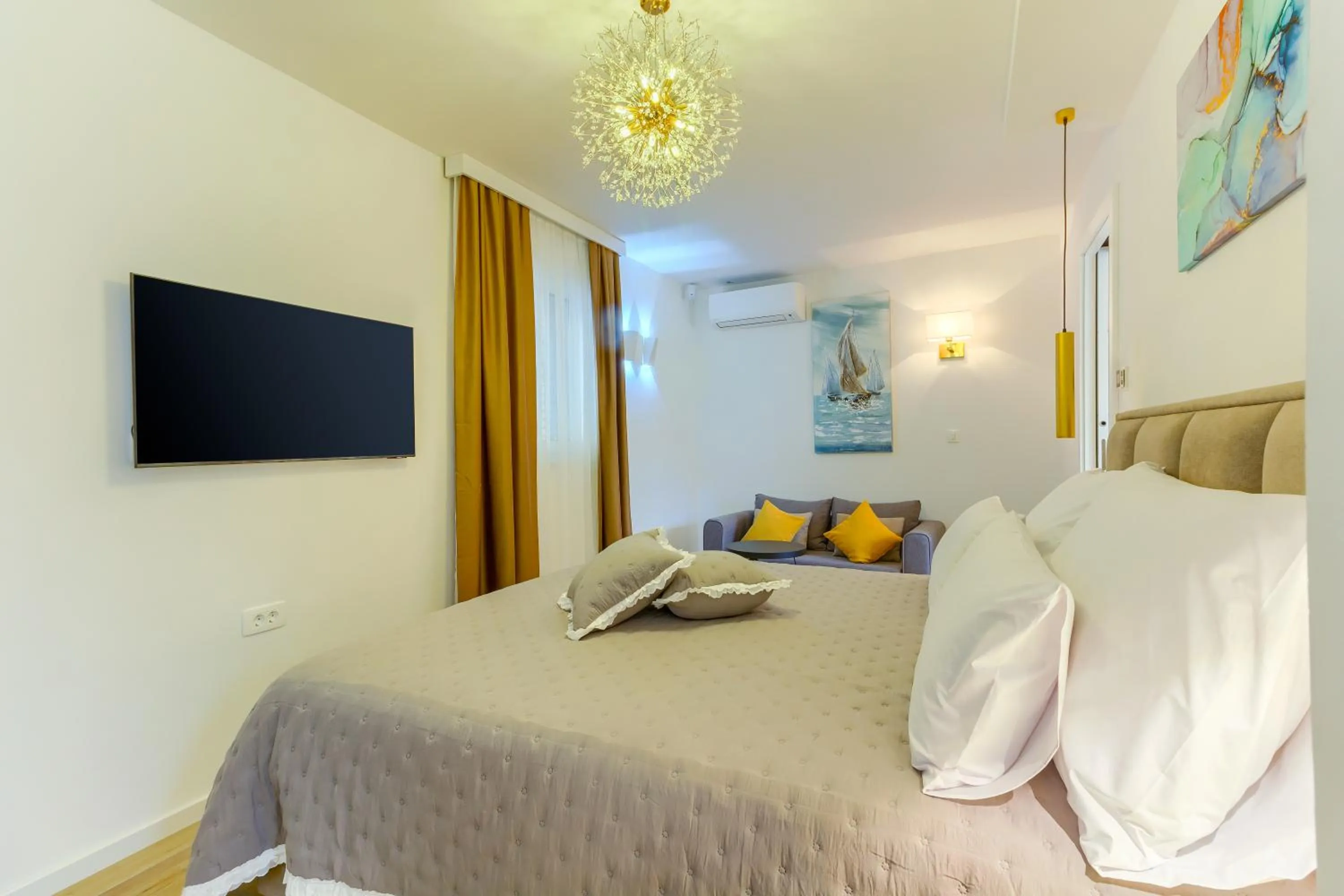 Bed in Irini Luxury Rooms