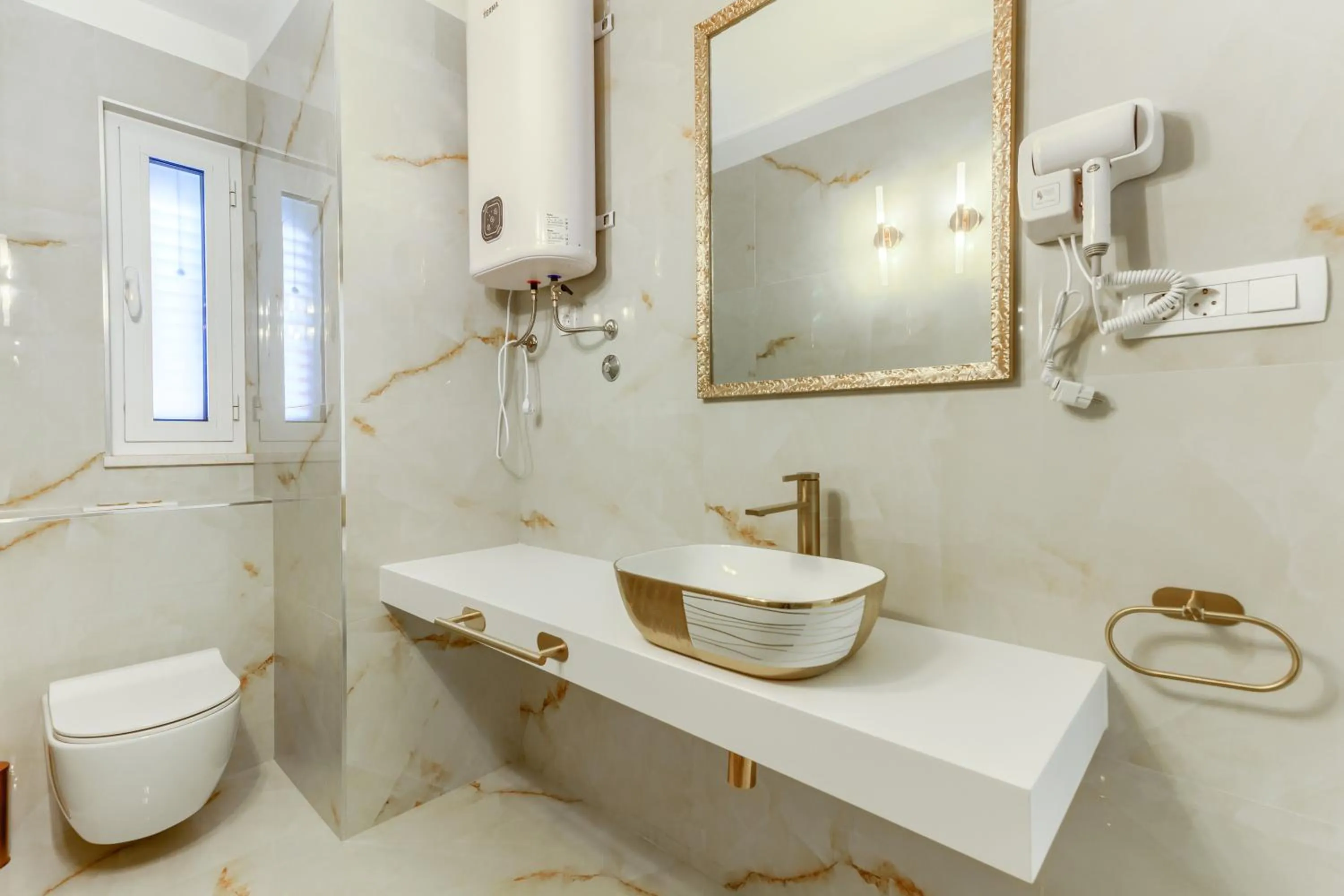 Shower in Irini Luxury Rooms