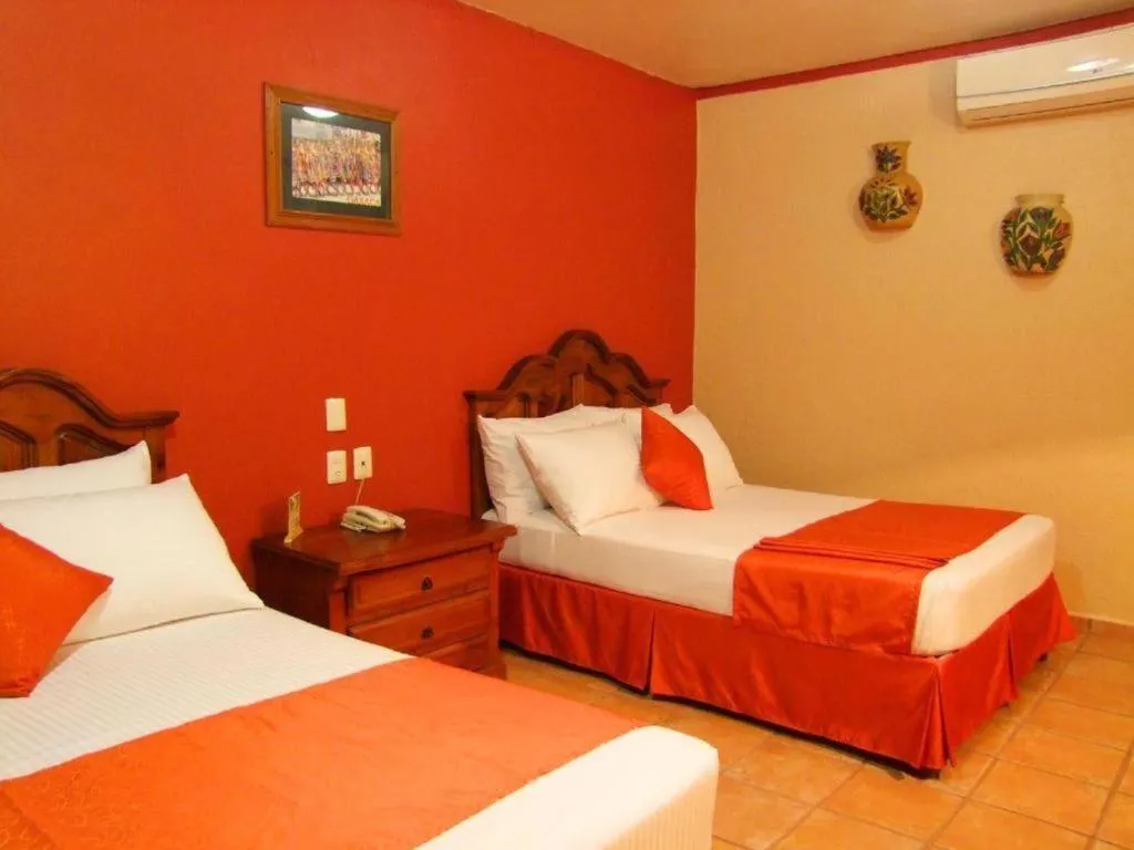 Bed in Hotel Oaxaca Dorado