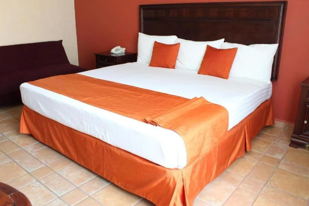 Bed in Hotel Oaxaca Dorado