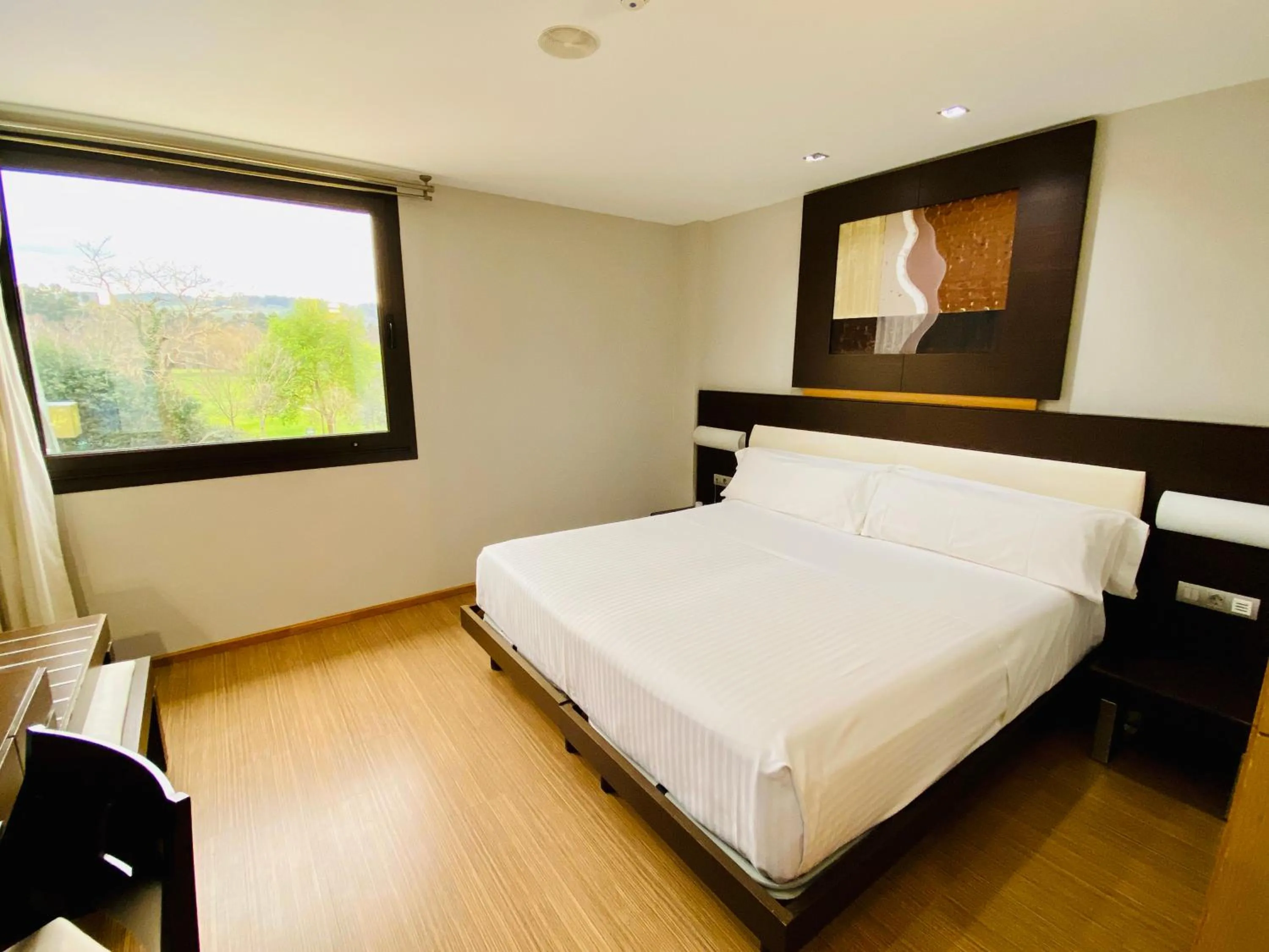 Bed in Oca Palacio De La Llorea Hotel & Spa