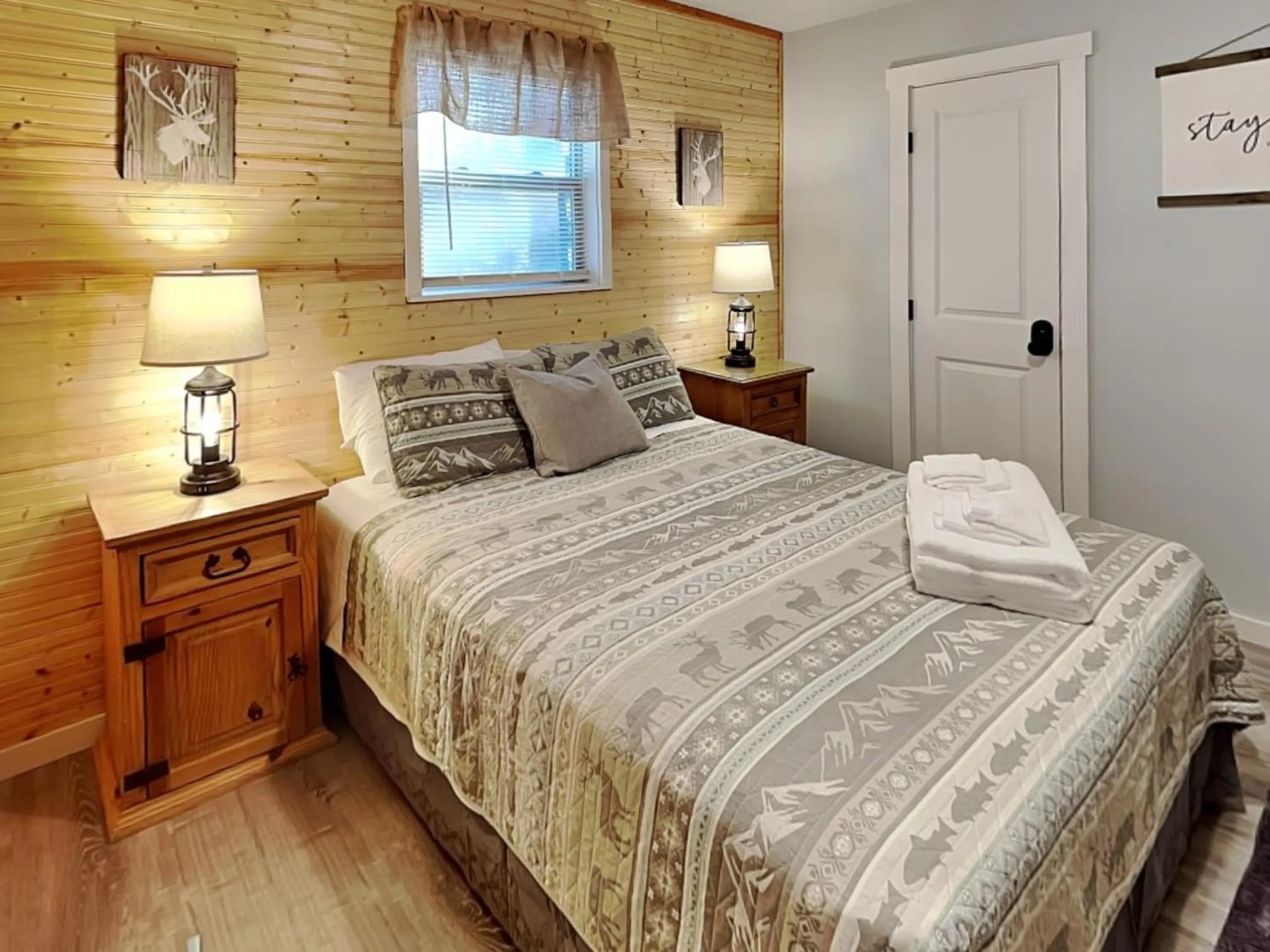 Bed in The Elk Meadow Cozy Cabin