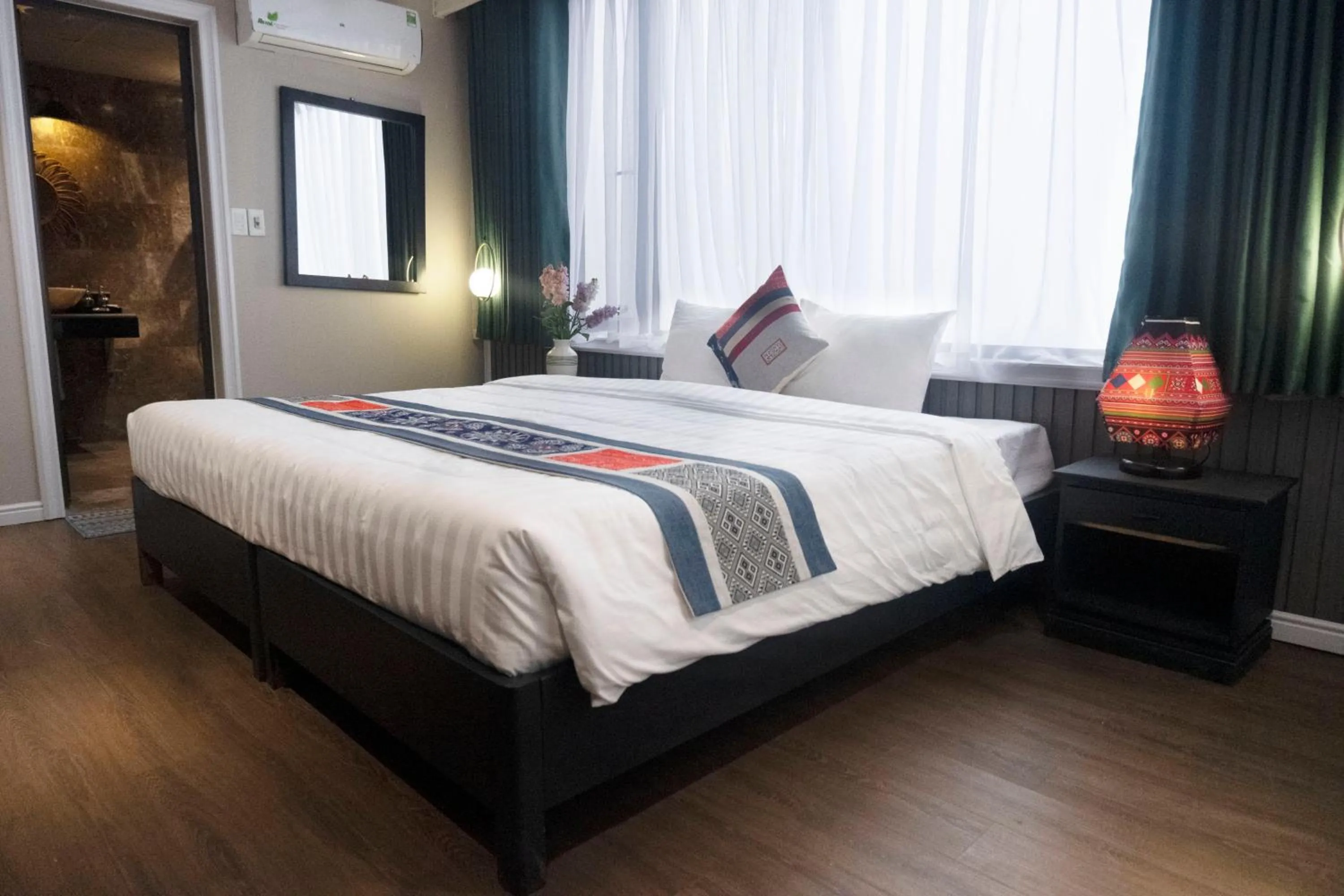 Bed in Swan Sapa Hotel