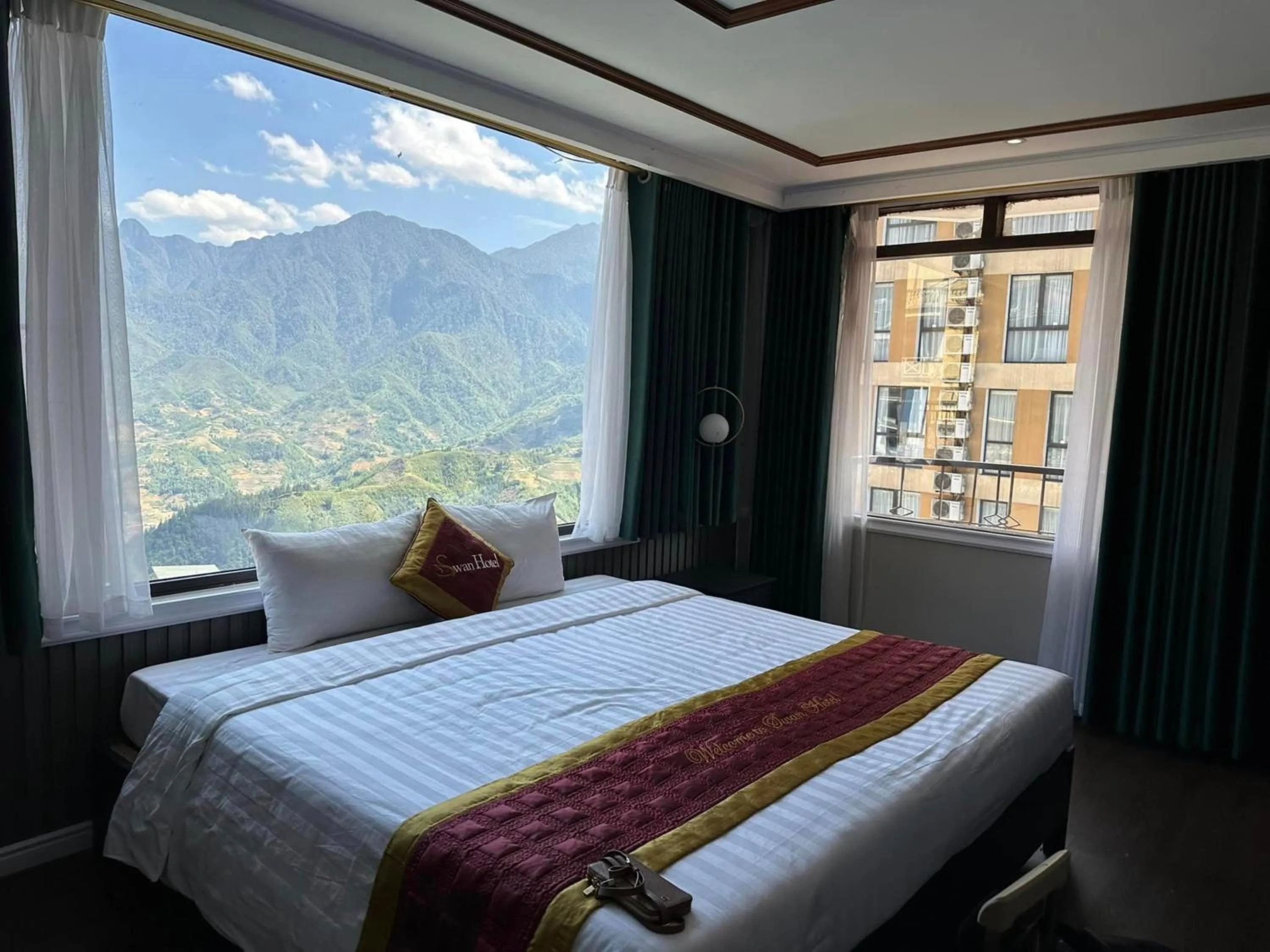 Photo of the whole room, Bed in Swan Sapa Hotel