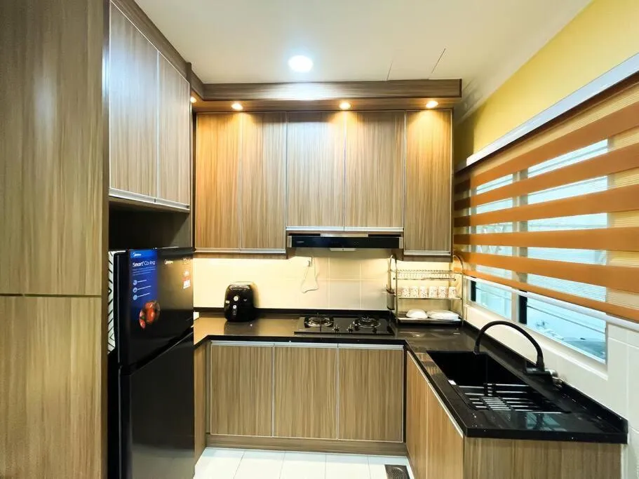 Kitchen or kitchenette in SK Homestay Seremban 2