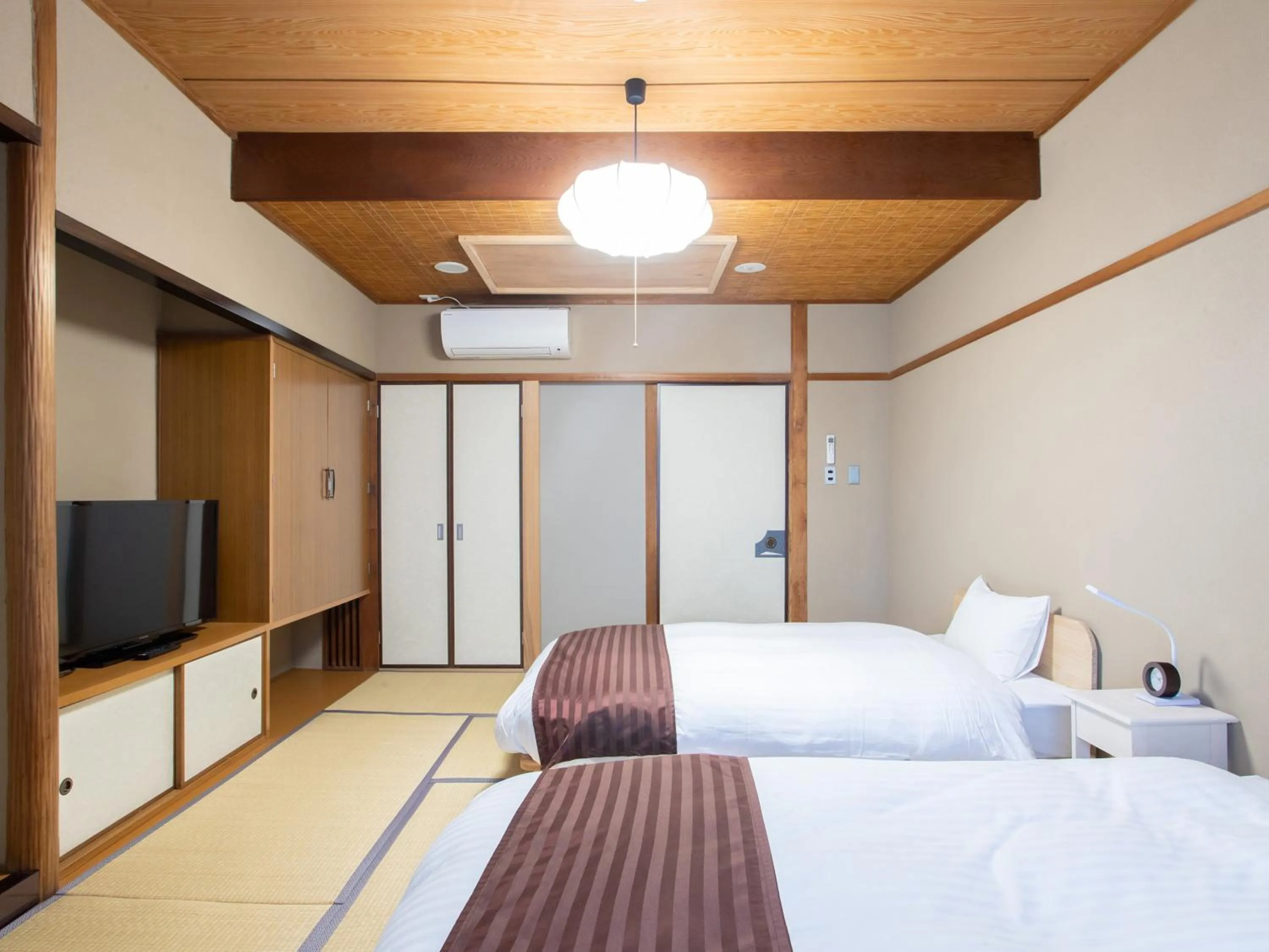 Photo of the whole room, Bed in Tabist Hotel Chouseikaku