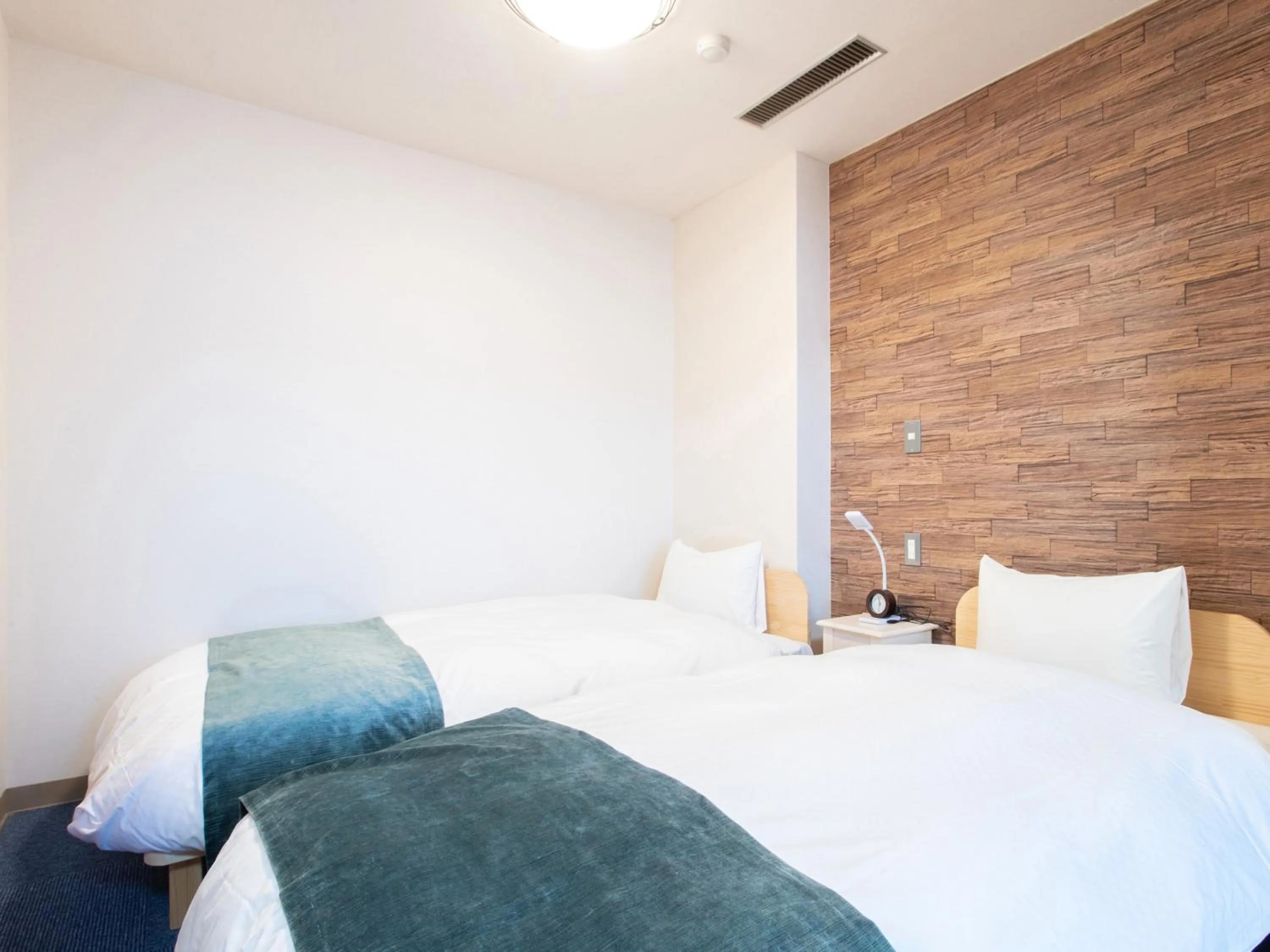 Photo of the whole room, Bed in Tabist Hotel Chouseikaku