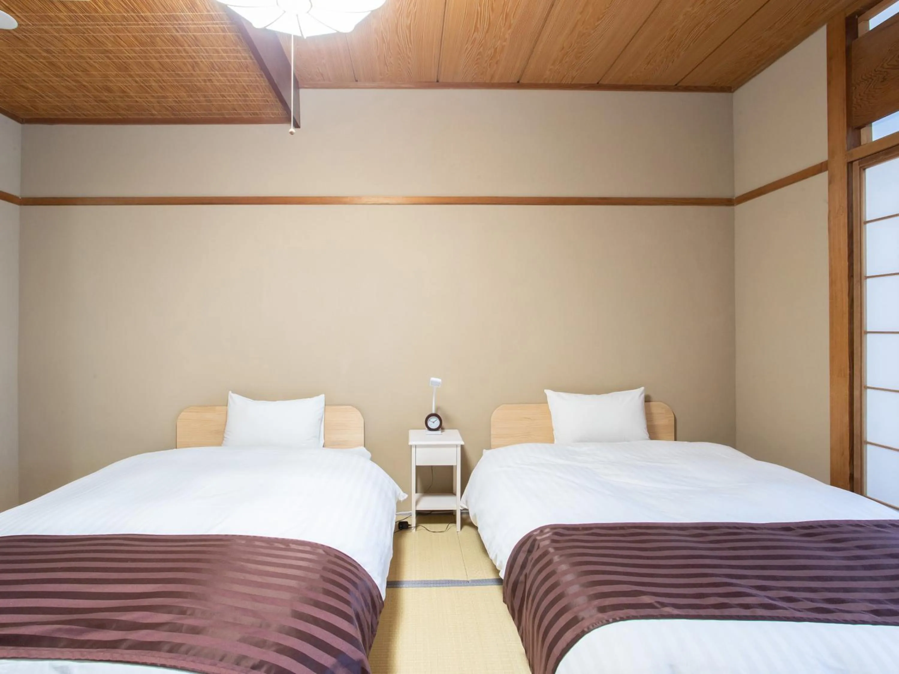 Photo of the whole room, Bed in Tabist Hotel Chouseikaku