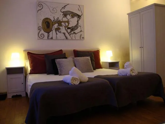 Photo of the whole room, Bed in Petit Hotel